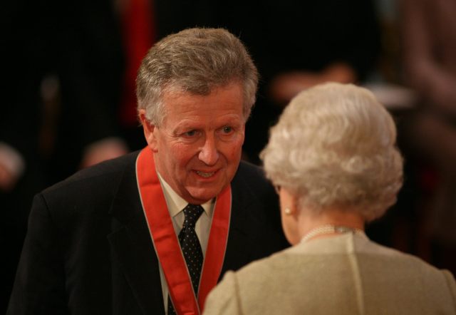 Michael Schluter receiving  a CBE from Queen Elizabeth II in 2009. Photo credit should read: Johnny Green/PA
