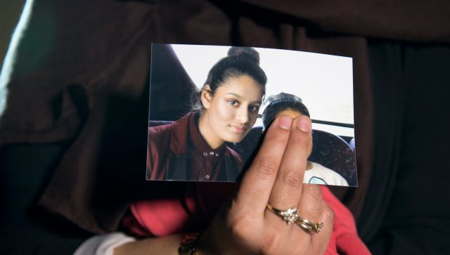 A picture of Shamima Begum being held by her sister. Credit: Laura Lean / PA