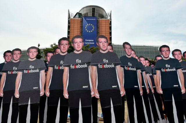 Cardboard cutouts of Facebook chief Mark Zuckerberg. Credit: John Thys / AFP / Getty