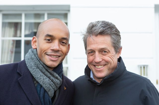 Hugh Grant knocking on doors with Chuka Umunna. Credit: Nicola Tree / Getty