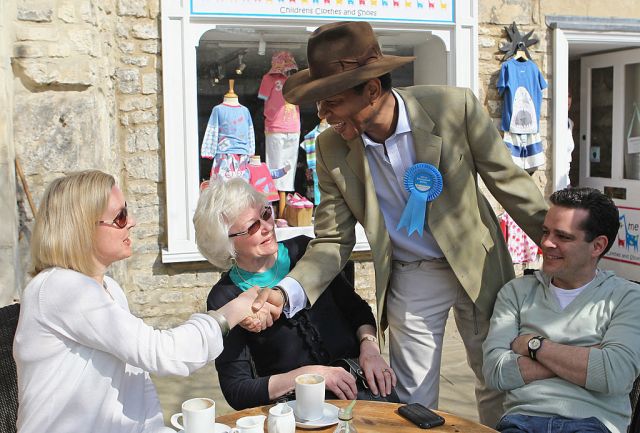 Conservative candidate Wilfred Emmanuel-Jones speaks to prospective voters, yet the party as a whole has failed to win the black vote Photo: Matt Cardy/Getty Images