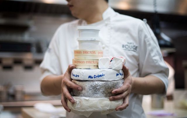 Unique species of cheese are going extinct because they can't be mass-produced. Credit: JOHANNES EISELE/AFP via Getty Images