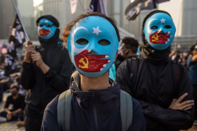 Showing solidarity for China's Uighurs, unlike the useful idiots. Credit: Dale DE LA REY / AFP/Getty