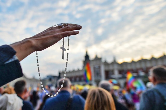 Members of a religious and anti-LGBT group praying outside St. Mary basilica during the annual Krakow Equality March 2020.
This year's edition of the Equality March has been changed to a different format due to measures imposed by the government and the 'Yellow Status' zone for the city of Krakow imposed by the Ministry of Health just a couple of days ago. The annual march took place around the Main Square.
The Far Right nationalists and Pro-Life activists organised a counter protest, against the LGBT, on the opposite side of the square, and next to St. Mary basilica.
On August 29, 2020, in Krakow, Lesser Poland Voivodeship, Poland. (Photo by Artur Widak/NurPhoto via Getty Images)
