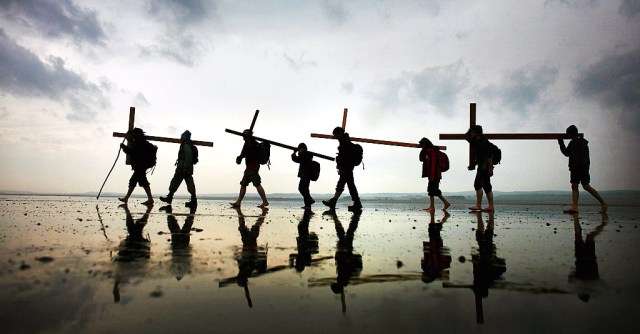 Pilgrims in Northumbria, where the holy history owes much to Irish missionaries. Credit: Jeff J Mitchell/Getty Images