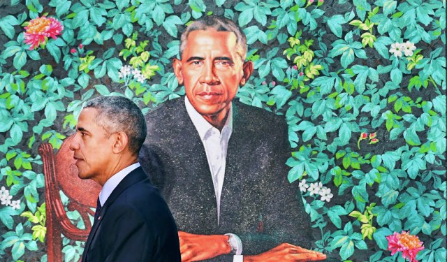 Obama watches over himself like a father observing a high-achieving son. Credit: Matt McClain/The Washington Post via Getty Images
