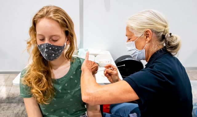 A Dutch child gets jabbed (Photo by Patrick van Katwijk/BSR Agency/Getty Images)