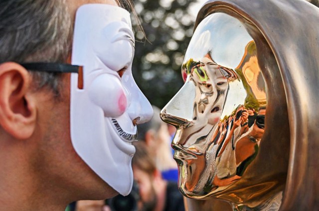 Will the kings of crypto end up going to war? Credit: ATTILA KISBENEDEK/AFP via Getty Images