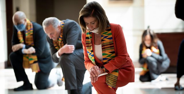 She's not kneeling hard enough imo. (Photo by BRENDAN SMIALOWSKI/AFP via Getty Images)