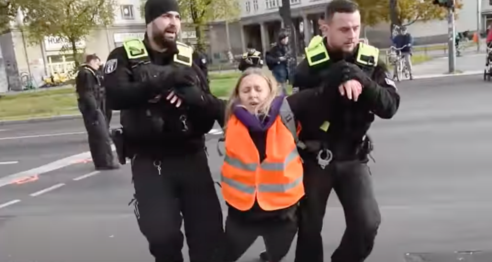 German police raid climate activists who blocked traffic - BBC News