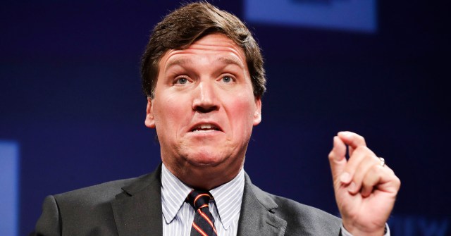 Tucker Carlson’s fake populism