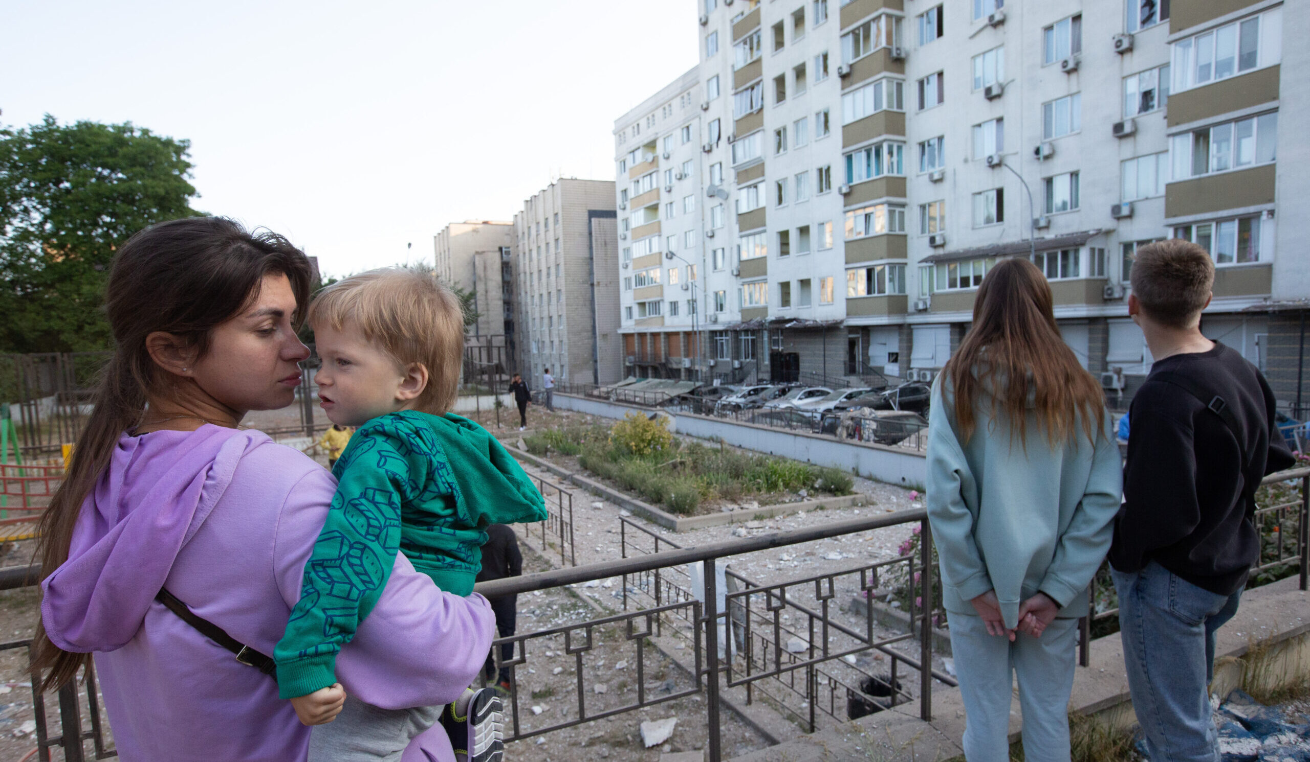 Kyiv residents near a damaged site in the aftermath of Tuesday's drone attack. Credit: Getty