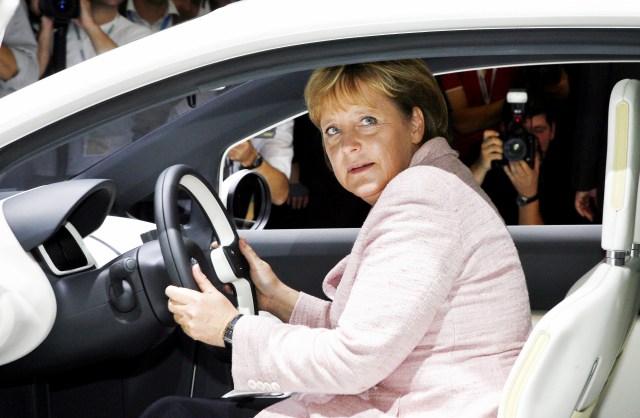 Angela Merkel behind the wheel of a VW prototype in 2007. Torsten Silk/DDP/AFP via Getty Images