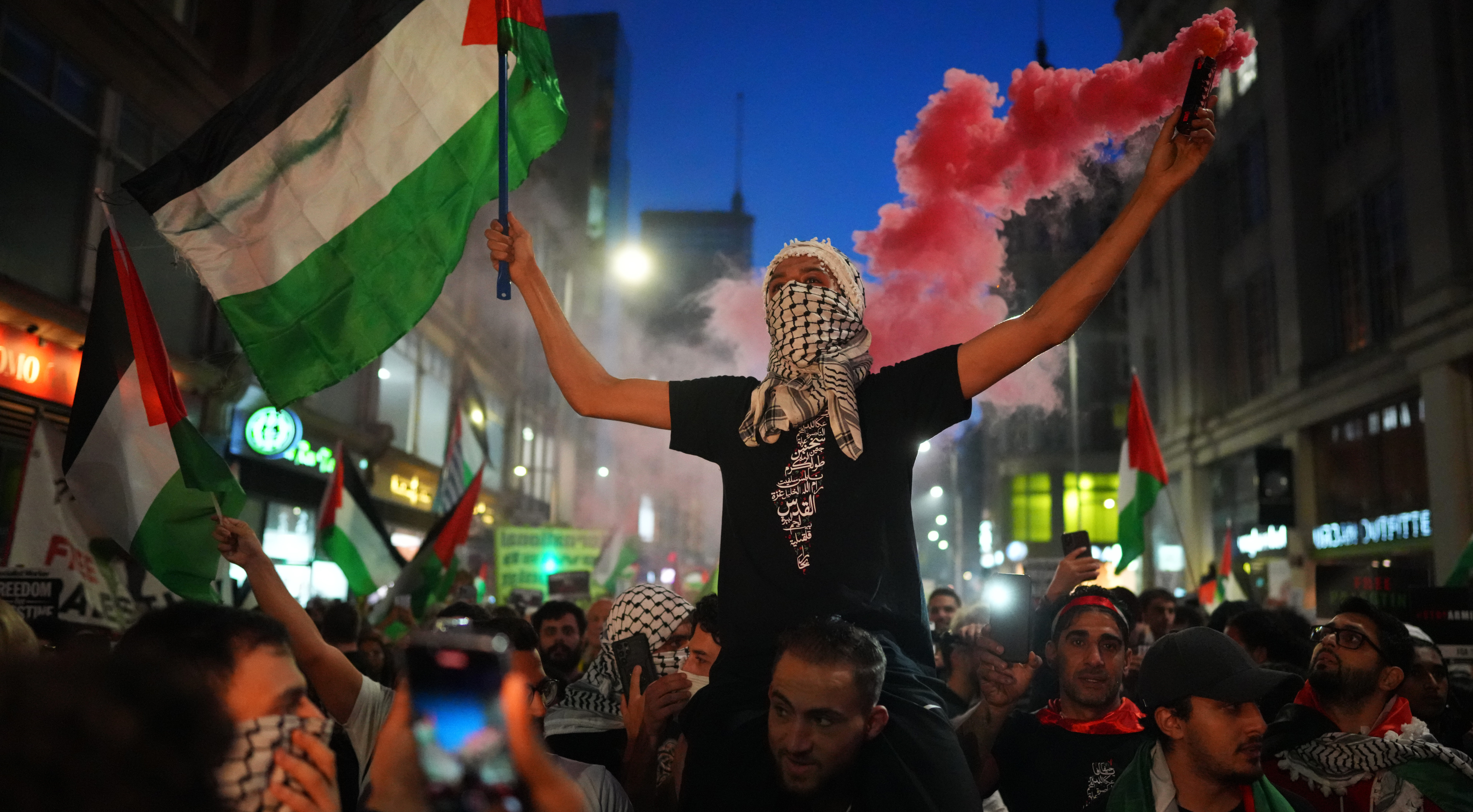 Supporters of Palestine outside the Israeli embassy in London last night. Credit: Getty