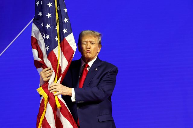 Donald Trimp shows off his patriotism at CPAC this week. Credit: Getty