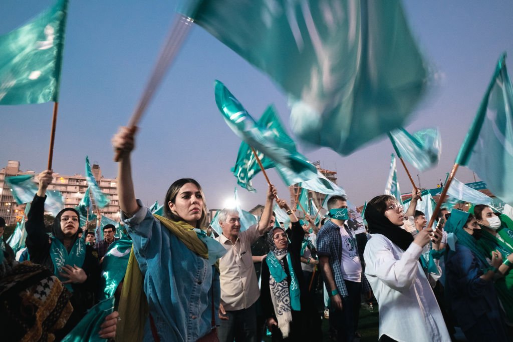 Supporters of reformist candidate Masoud Pezeshkian attend a rally in Tehran on Wednesday. Credit: Getty