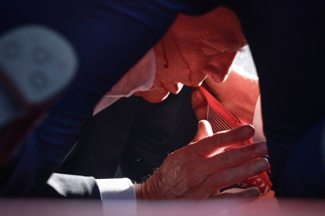Donald Trump onstage after last night's shooting in Pennsylvania. Credit: Getty