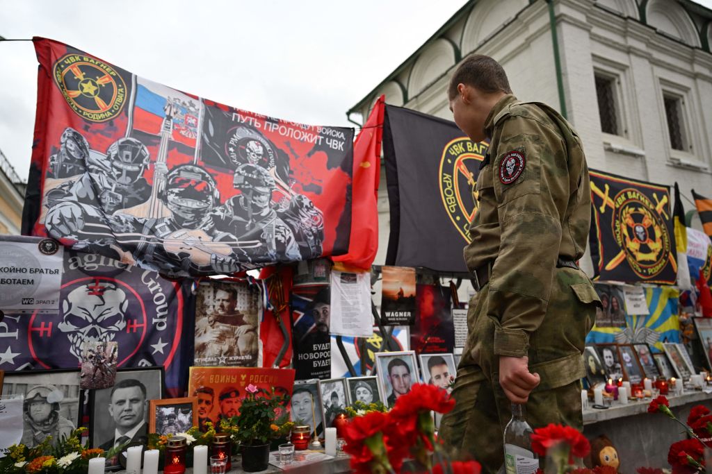 Soldiers visit a makeshift memorial for Yevgeny Prigozhin in Moscow last year. Credit: Getty