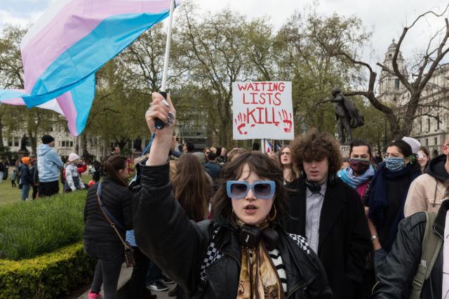 Activists protest against the puberty-blocker ban in London earlier this year. Credit: Getty