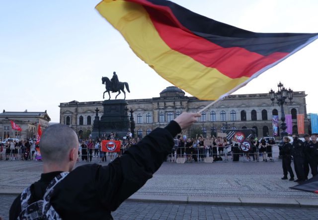 An AfD supporter confronts antifascist protestors in Saxony earlier this week. Credit: Getty