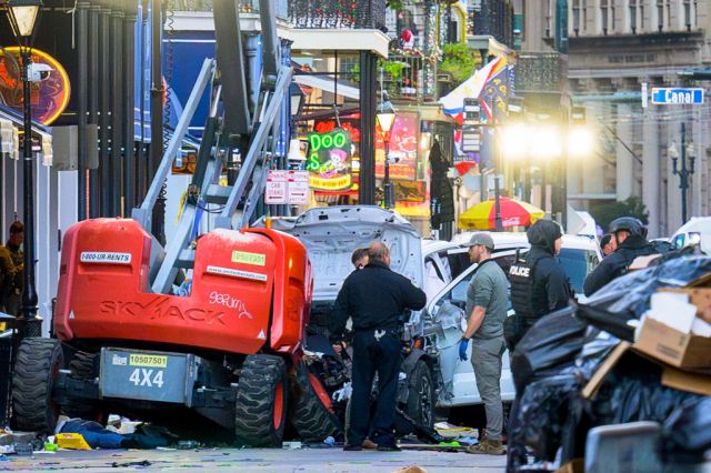 Police investigators surround the pickup truck used to kill pedestrians in New Orleans on 1 January. Credit: Getty