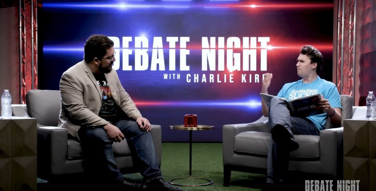 Ben Burgis debates Charlie Kirk in 2021. Credit: Getty