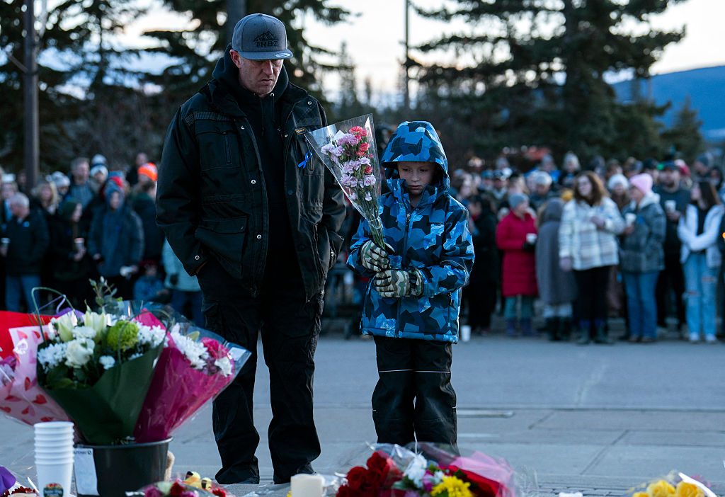 Mourners pay their respects after the Tumbler Ridge shooting in British Columbia earlier this month. Credit: Getty