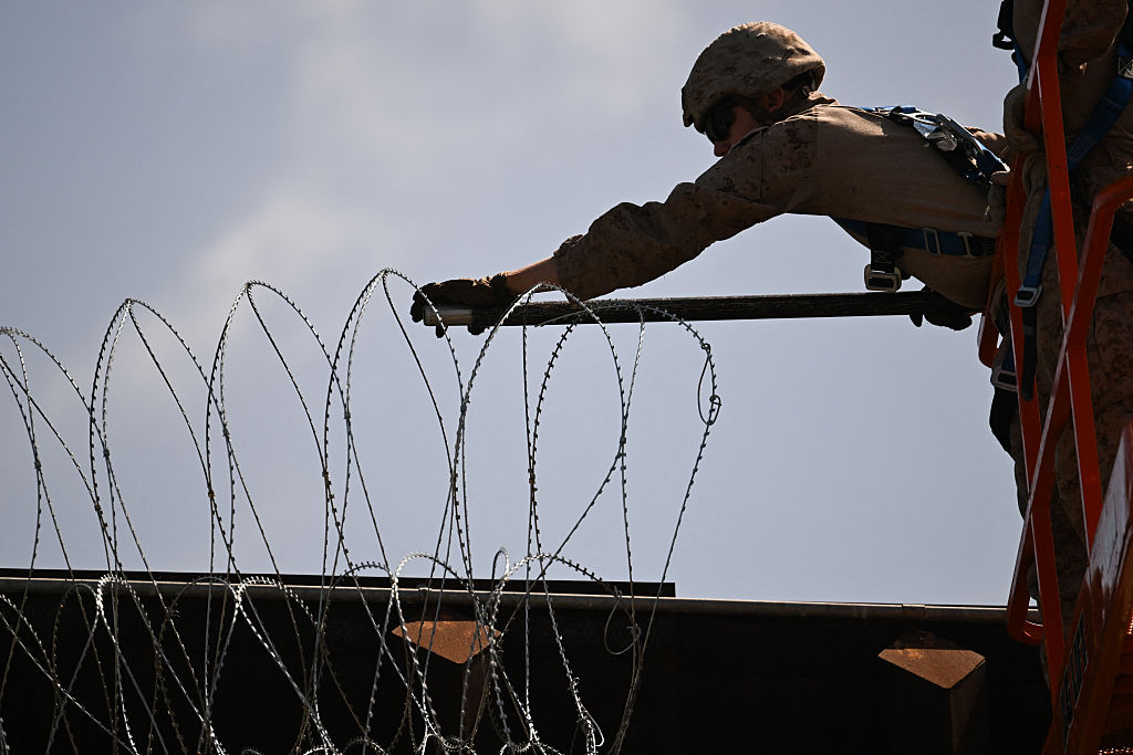 US troops monitor the US-Mexico border near San Diego, California. Credit: Getty