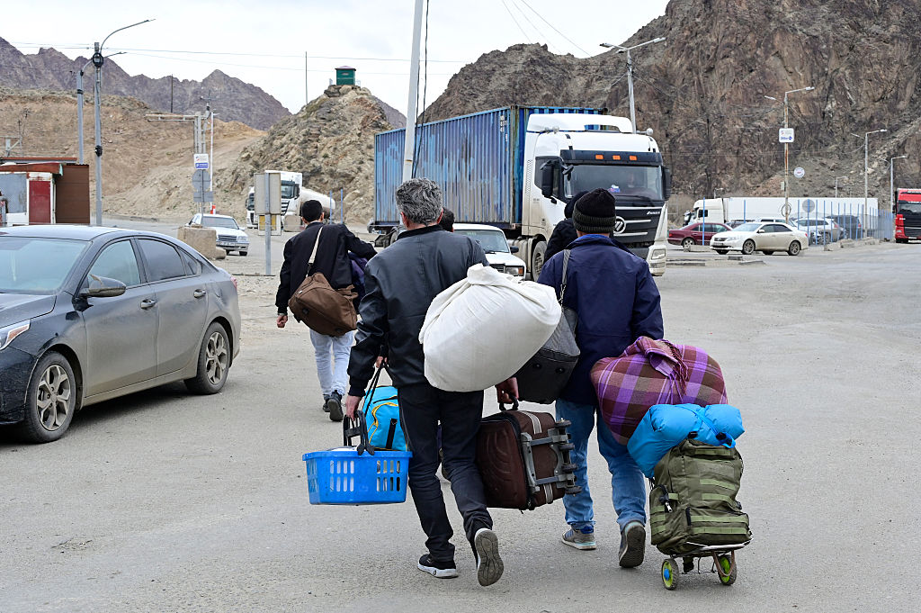 Iranian refugees crossing the border to Armenia. Credit: Getty.
