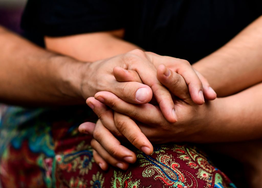 Poly prayer. Credit: Getty
