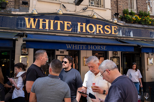 Pubgoers engaging in some ‘vertical drinking’. Credit: Getty