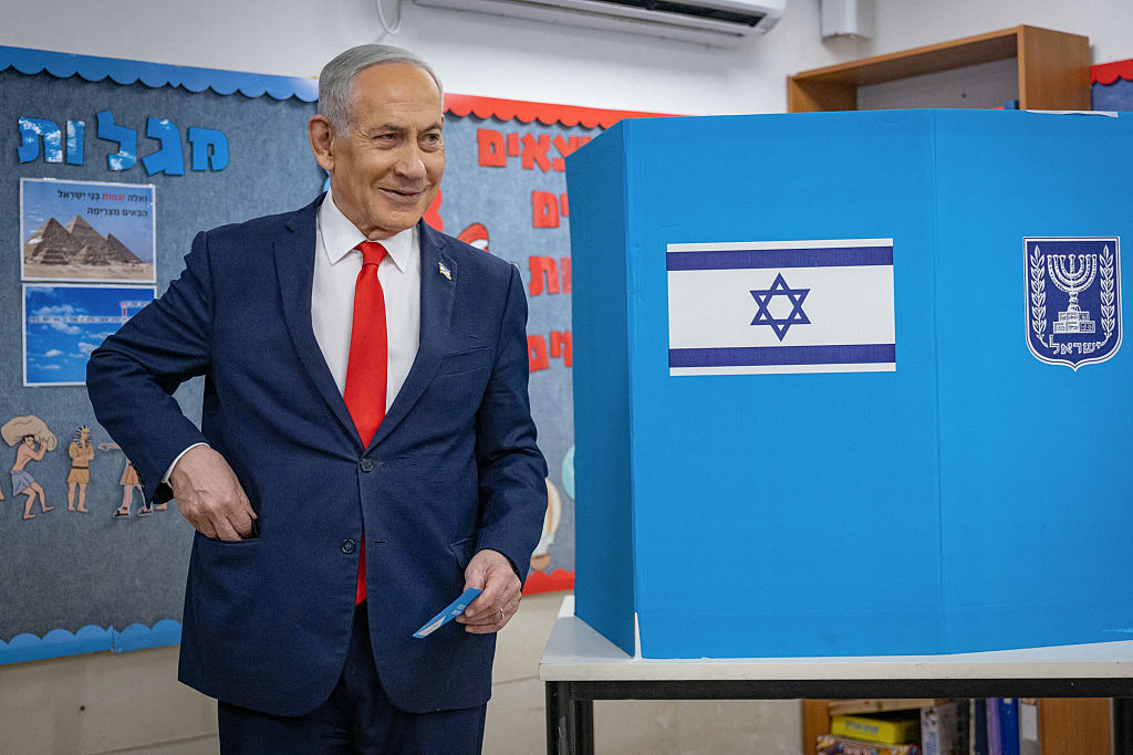 Benjamin Netanyahu votes at a polling station in Jerusalem yesterday. Credit: Getty