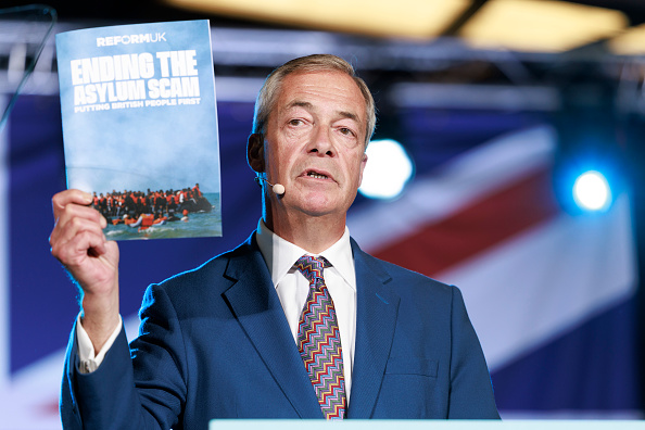 Nigel Farage unveils the proposal at a press conference this morning. Credit: Getty